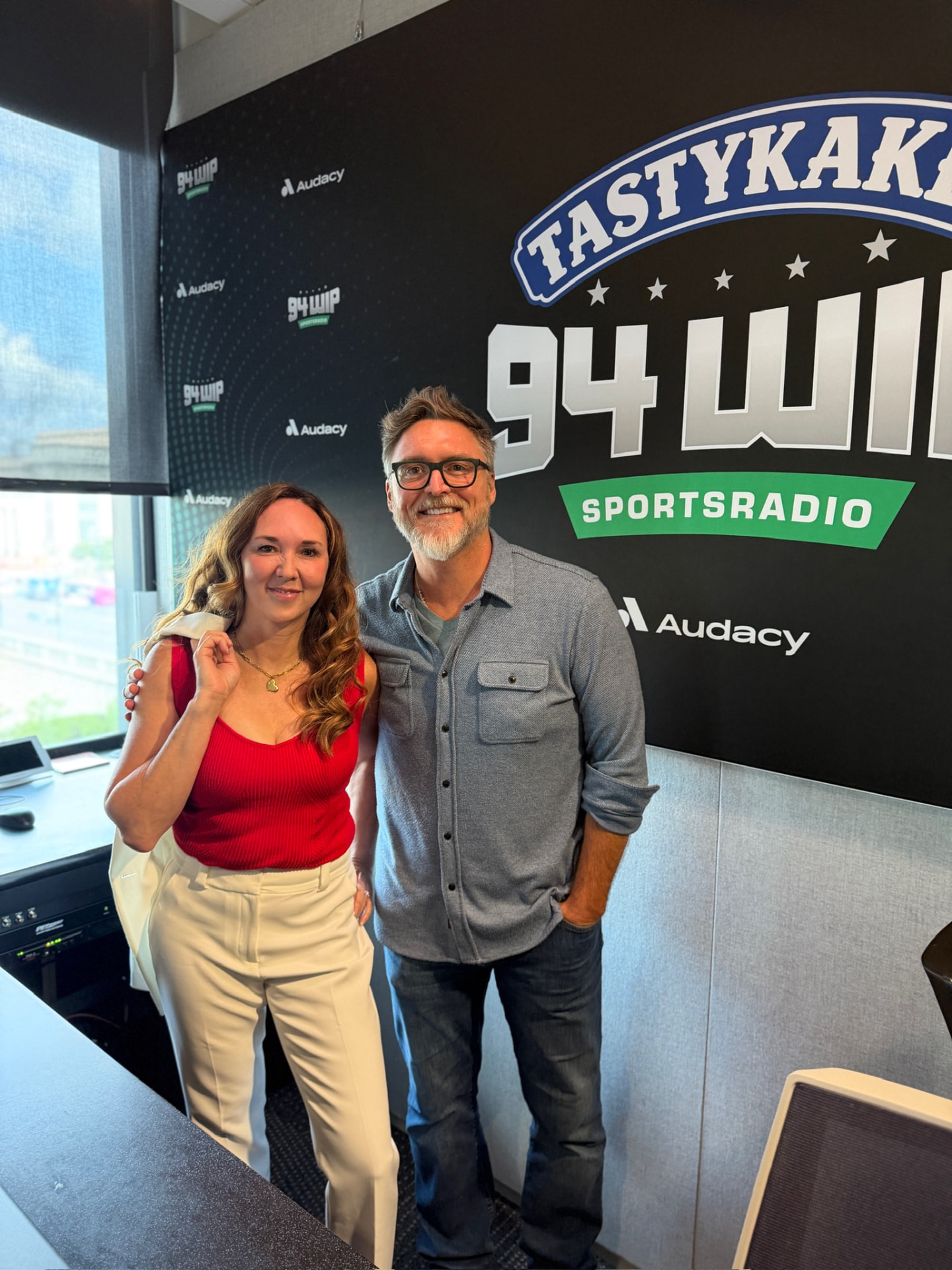 Dr. Lori Gerber and Jon Ritchie in the 94.1 WIP Morning Show studio